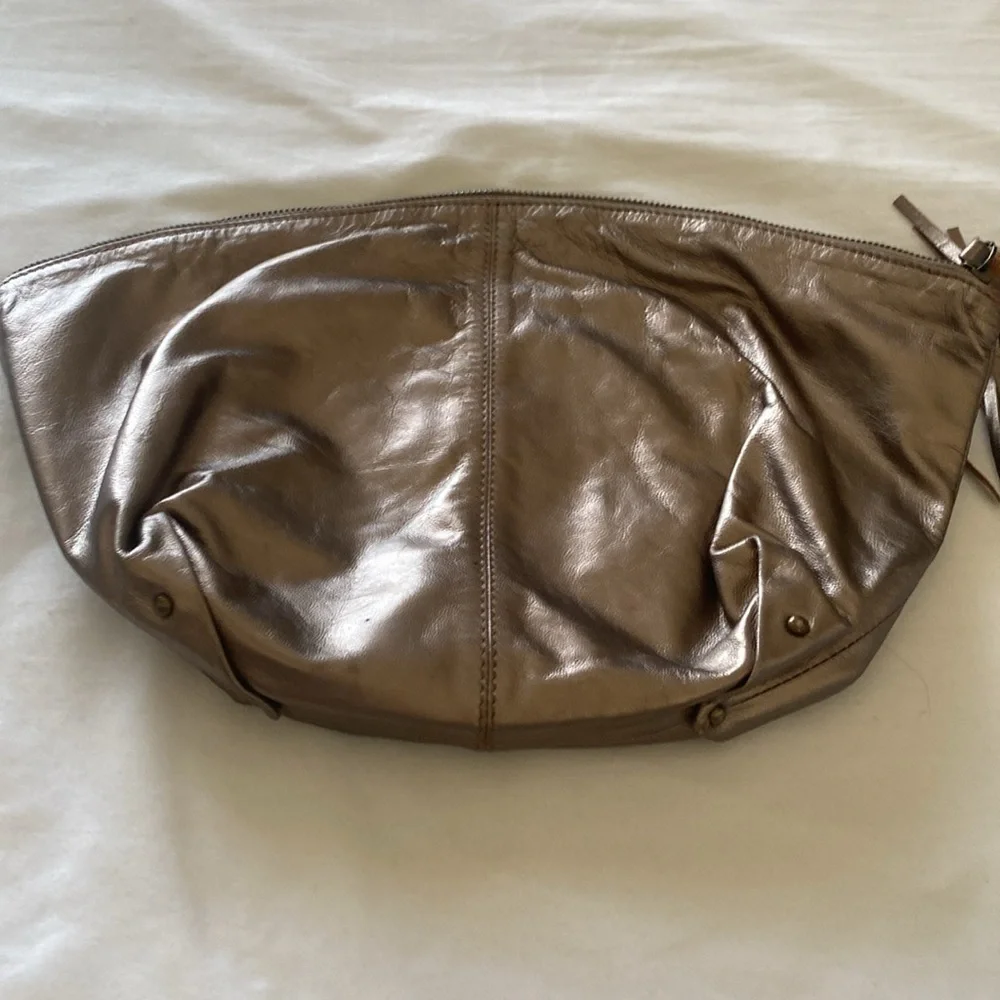 Jasper & Jeera Metallic Leather Clutch with Tassel